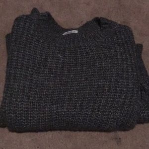 Long sleeved knitted sweater